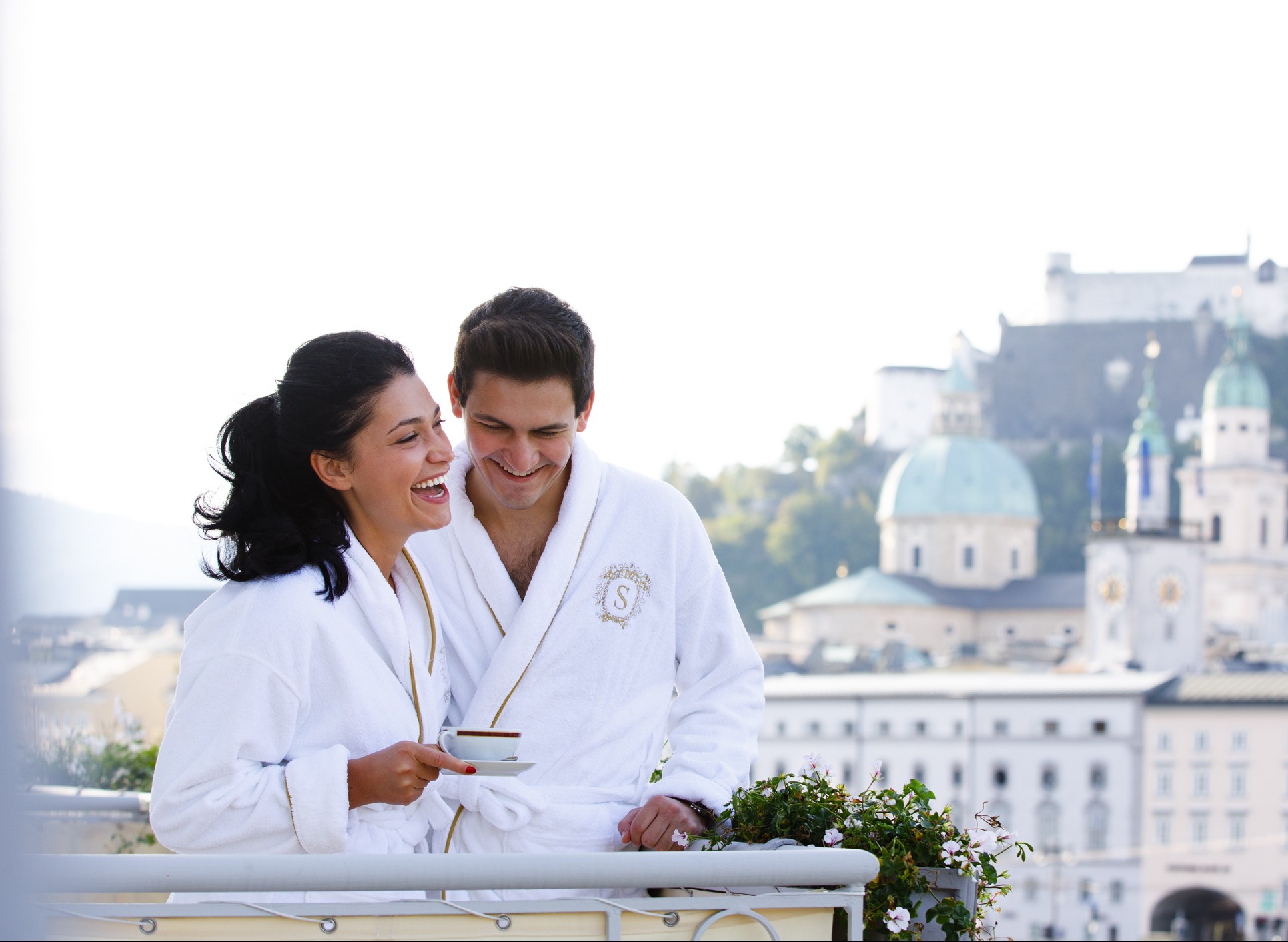 Morning bliss with a view — enjoying the charm of Salzburg from the balcony of Hotel Sacher Salzburg.