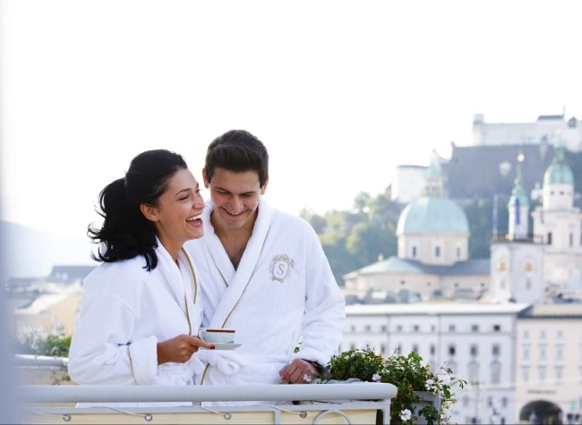 Morning bliss with a view — enjoying the charm of Salzburg from the balcony of Hotel Sacher Salzburg.