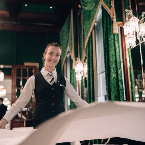 Grace in motion at the Grüne Bar—where timeless charm meets flawless service at Hotel Sacher Wien.