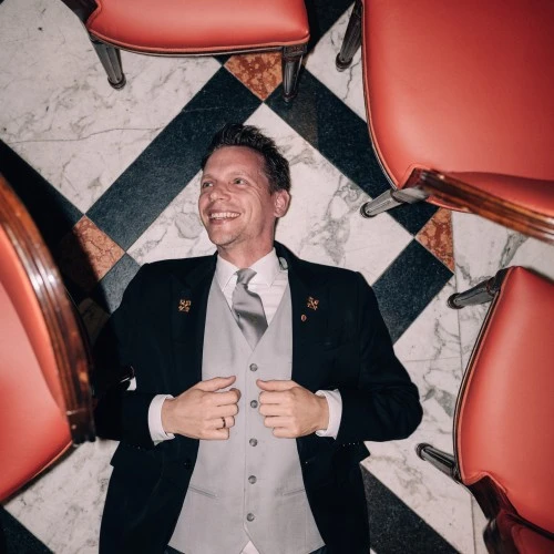 A moment of pure joy on the iconic marble floors of Hotel Sacher Salzburg—where elegance meets a touch of playfulness.