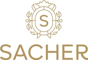Hotel Sacher logo featuring a gold 'S' emblem with elegant laurel wreath design with the name Sacher written under it.