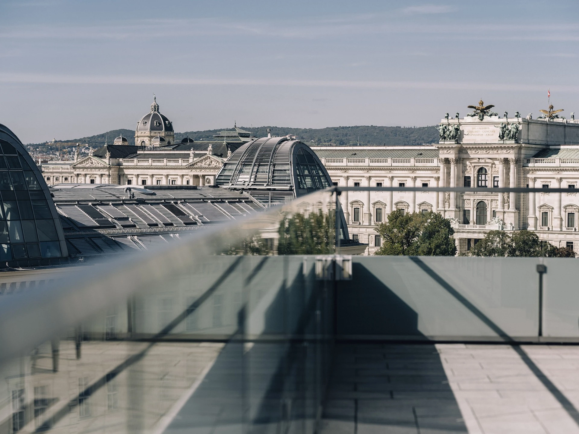 This image captures the terrace from a Signature Suite at Hotel Sacher Wien, offering a stunning view of the surrounding historical architecture.