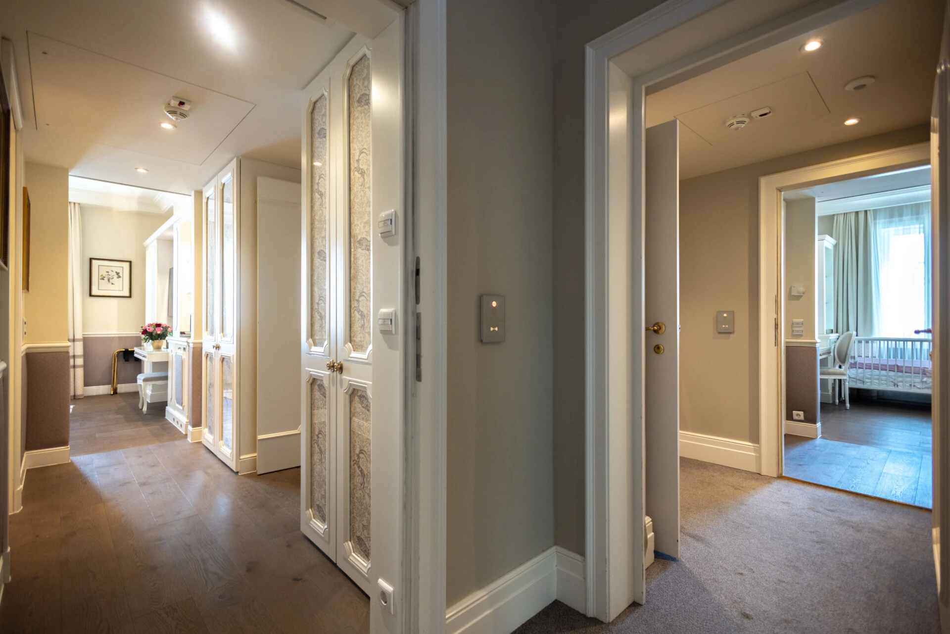 Connecting hallway in luxury family suite at Hotel Sacher with access to two separate bedrooms