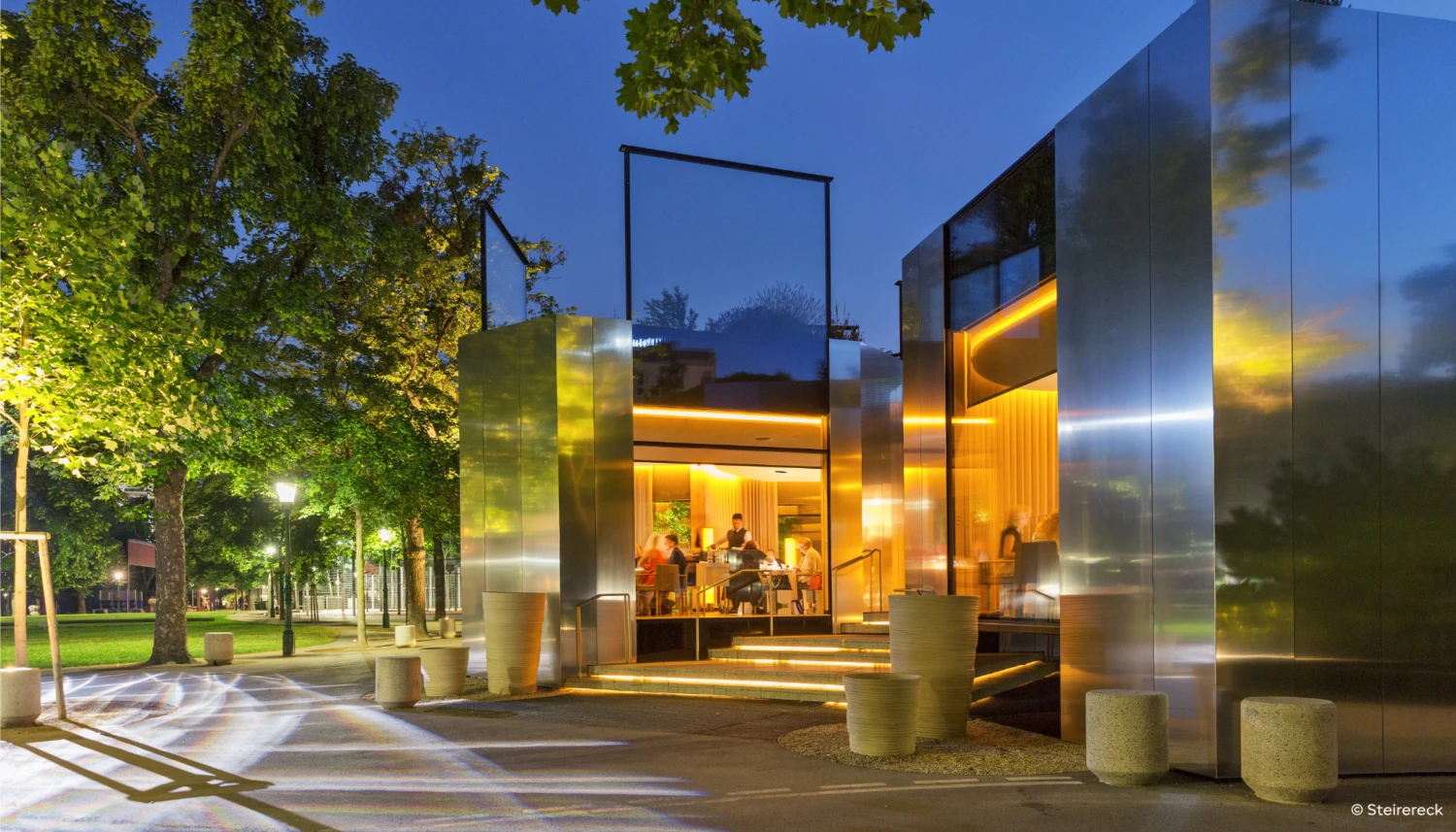 Restaurant Steirereck from the outside with modern fassade and looking into the inside.
