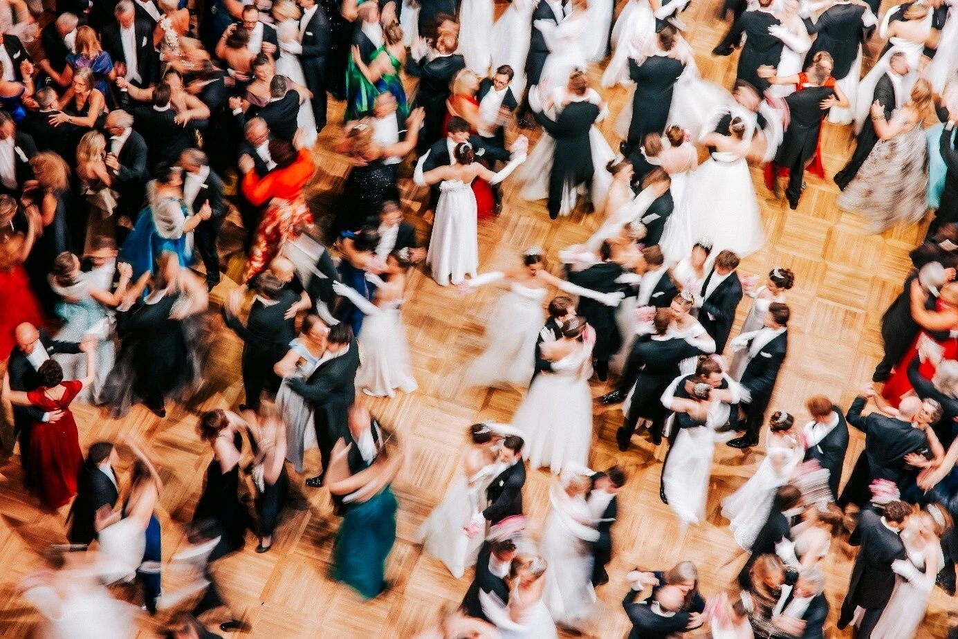 Dancing ball guests at the Vienna Opera Ball on the large dance floor of the Vienna State Opera