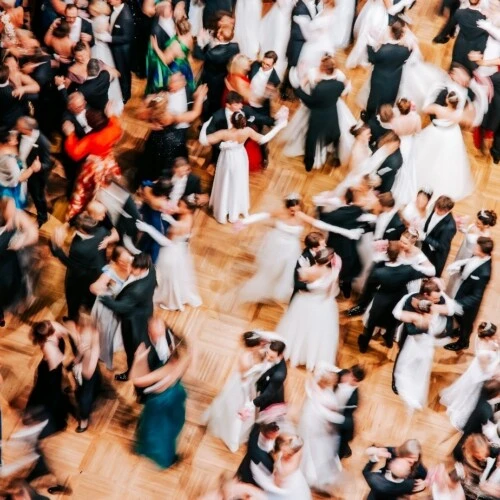 Dancing ball guests at the Vienna Opera Ball on the large dance floor of the Vienna State Opera
