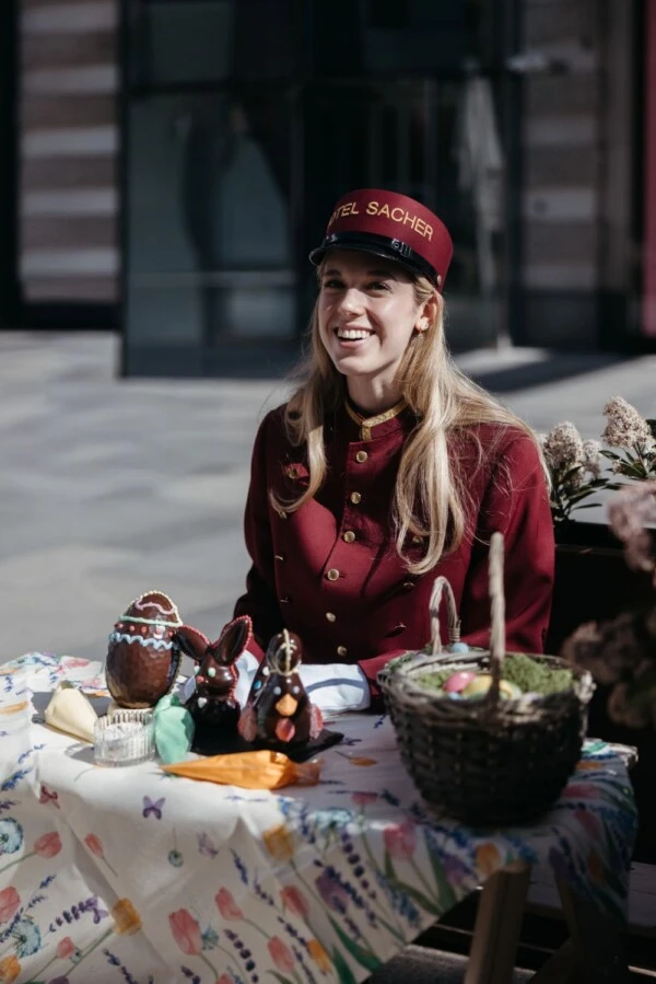 Bellboy with chocolate easter eggs and easter bunnies
