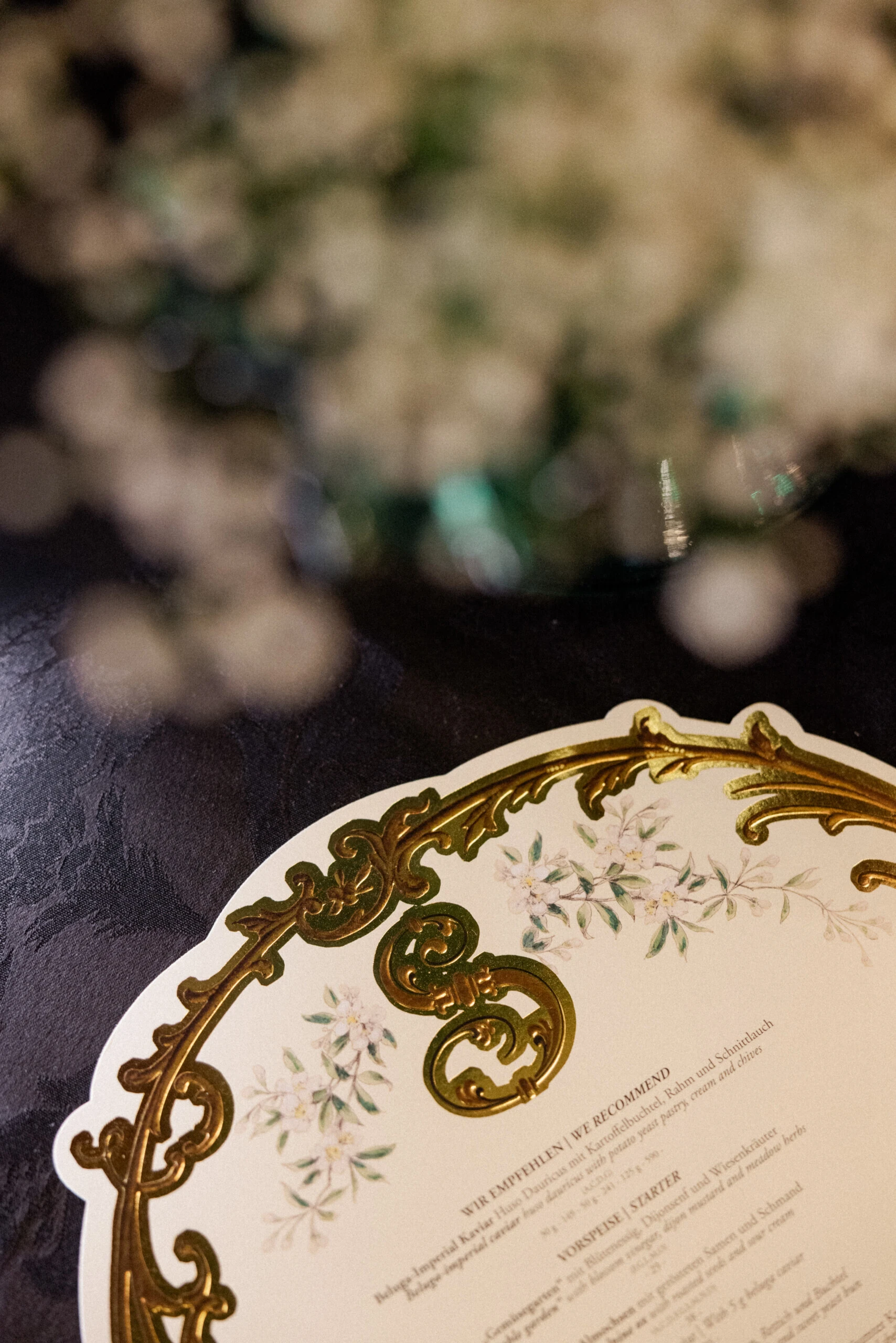 Close-up of the artistically designed menu at the Restaurant Grüne Bar.