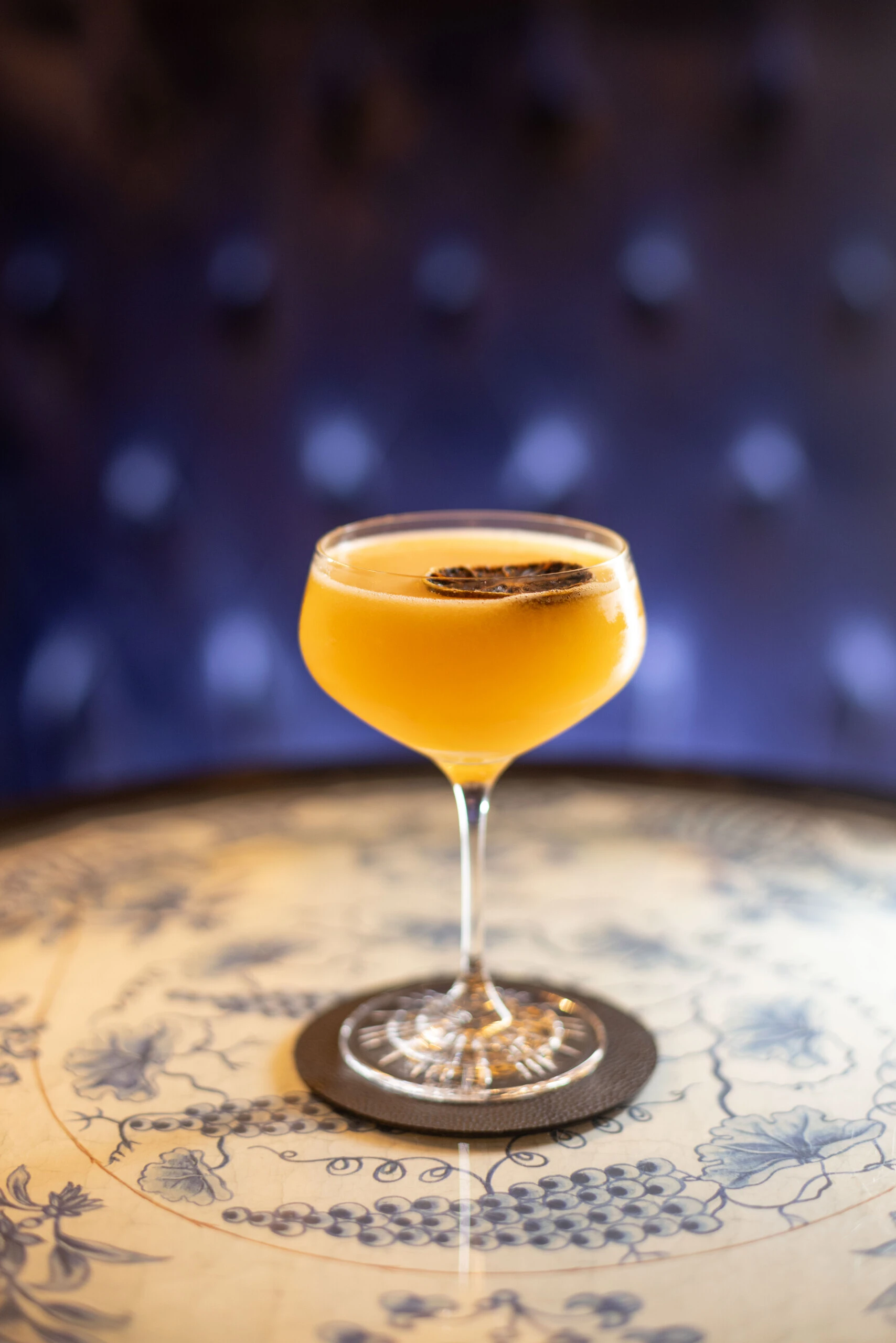 Sacher Martini served on a decorative table in the Blaue Bar.