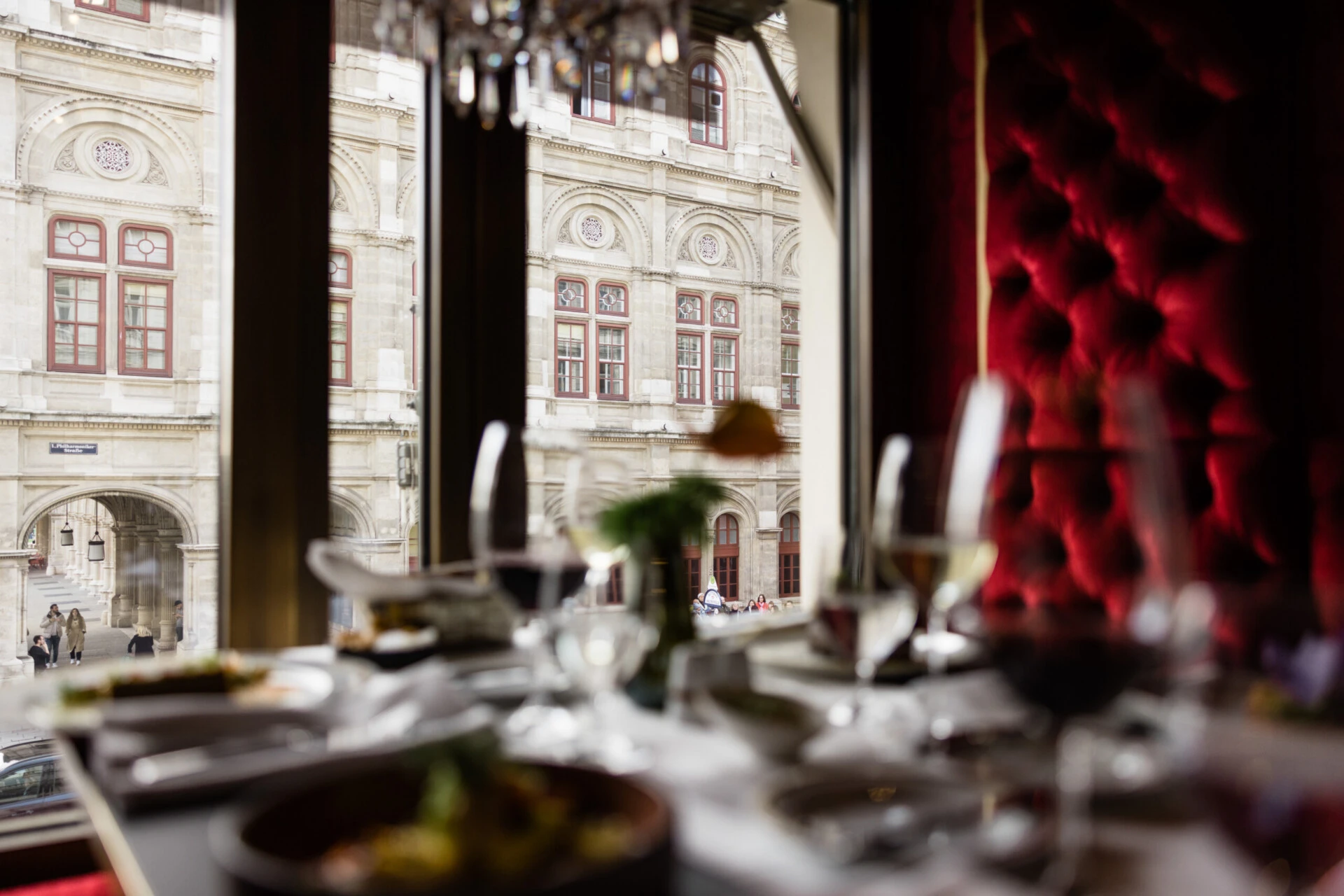 Guests raise glasses of white wine at Café Bel Étage.