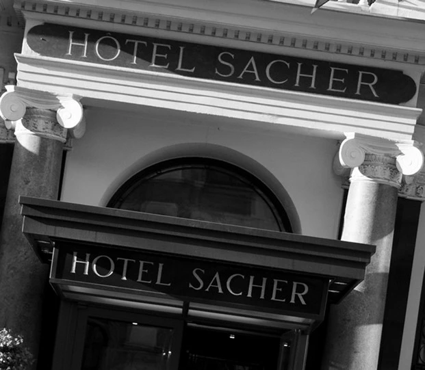 The iconic entrance of Hotel Sacher welcomes guests with timeless grandeur and Viennese charm.