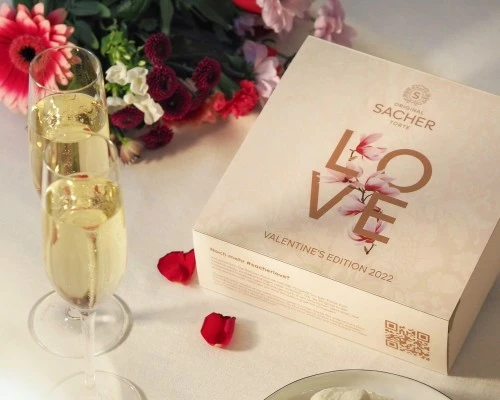 The image features the Original Sacher-Torte Valentine's Edition 2022, beautifully packaged with the word 